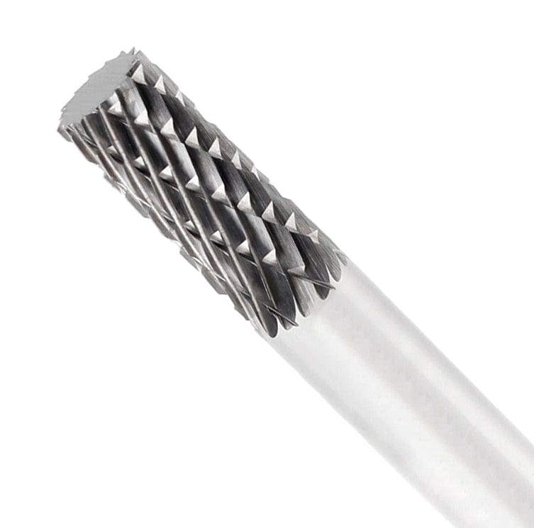 A detailed macro shot of the double-cut (cross-cut) flutes on the cylindrical head of the UCT Gem Carbide SA1 burr.