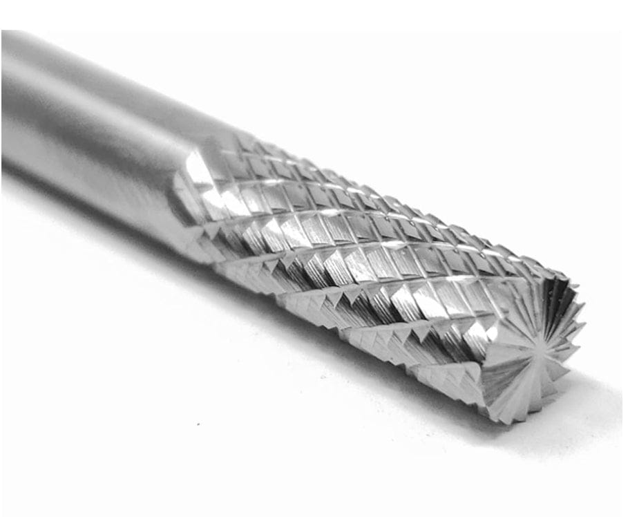 A detailed close-up studio shot of the double-cut, radius-end head of the UCT Gem Carbide SB1 burr.