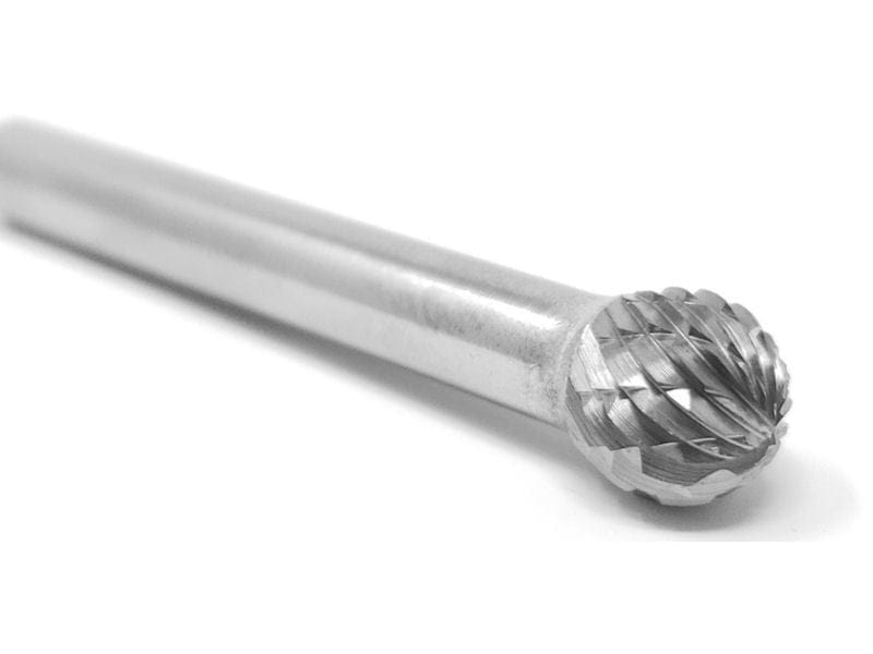 A close-up macro shot of the double-cut (cross-cut) flutes on the 3/8-inch ball-shaped head of the UCT Gem Carbide SD-3 burr.