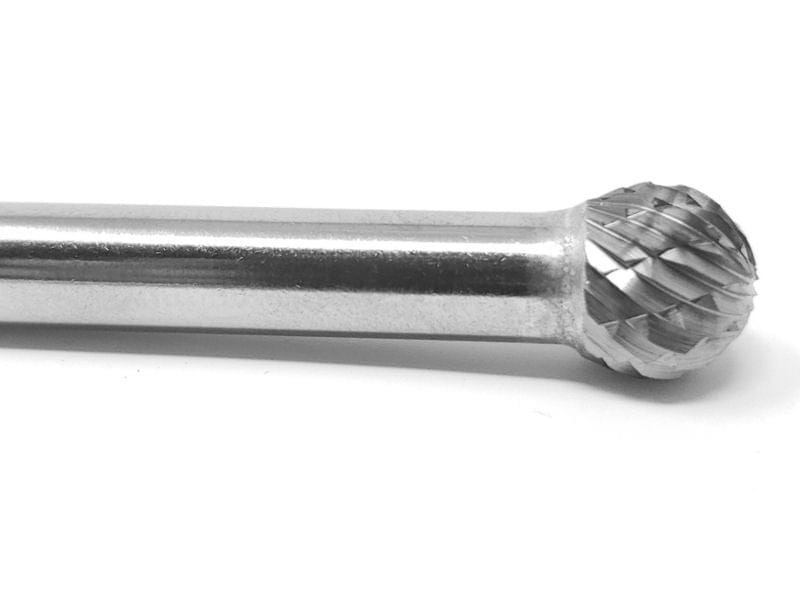 A close-up studio shot of the double-cut flutes on the 3/8-inch ball-shaped head of the UCT Gem Carbide SD-3 burr.