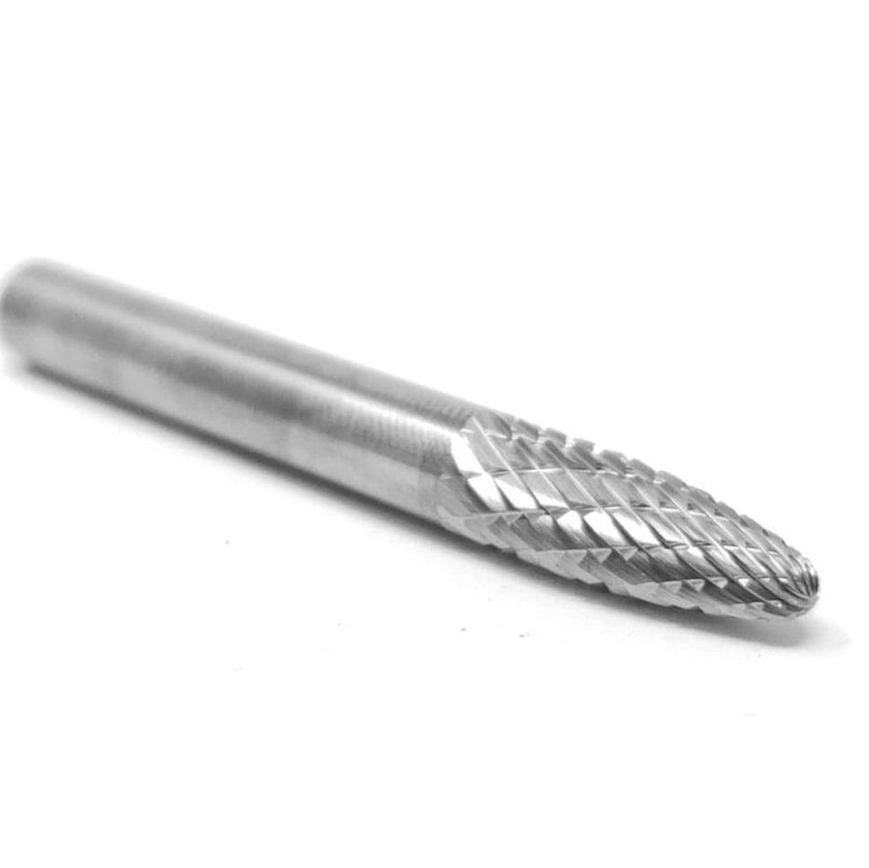 A three-quarter angle studio shot of the UCT Gem Carbide SF-1 burr, highlighting the double-cut flutes on its pointed, tree-shaped head.