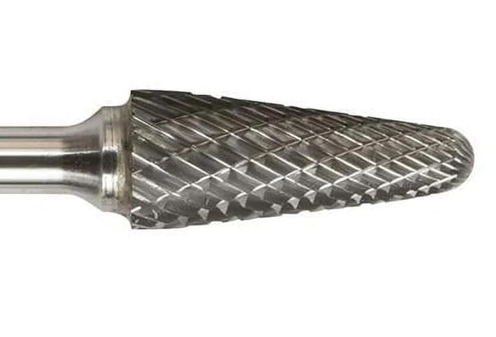 A close-up macro shot of the double-cut (cross-cut) flutes on the head of the UCT Gem Carbide SL-3 burr.