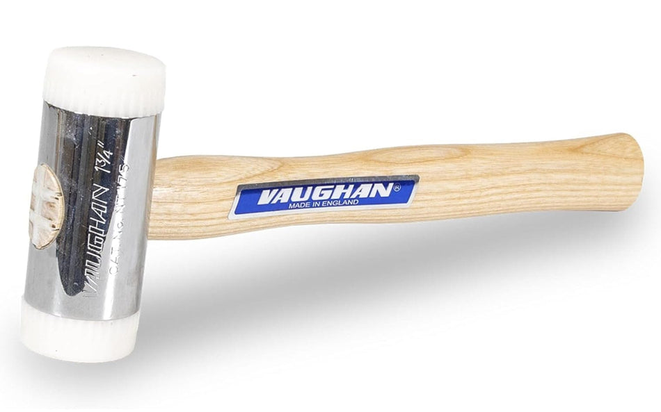 A close-up studio shot of the Vaughan Nt175 nylon-faced hammer, showing the chrome head, white nylon tips, and hickory handle with the Vaughan logo.