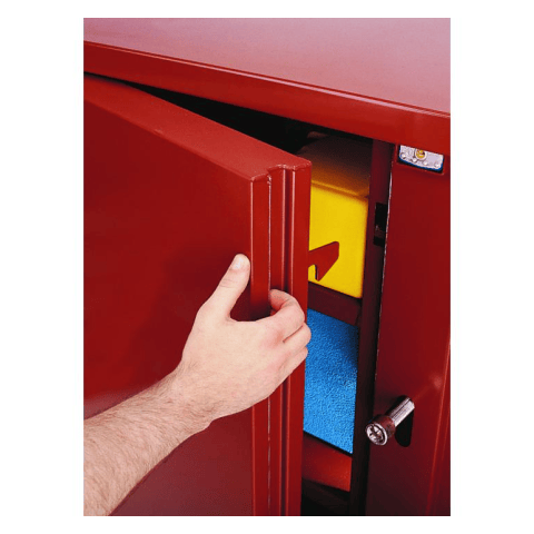 Close up of door opening. This is a close-up shot of a hand opening a red metal cabinet door. The cabinet reveals a yellow and blue object inside, and a silver lock is visible on the right side.