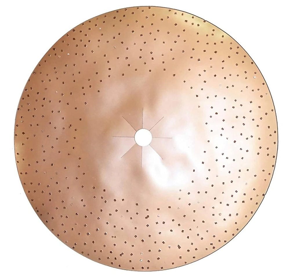 Circular metallic abrasive disc with central mounting hole and square perforations, designed for industrial or surface prep applications.