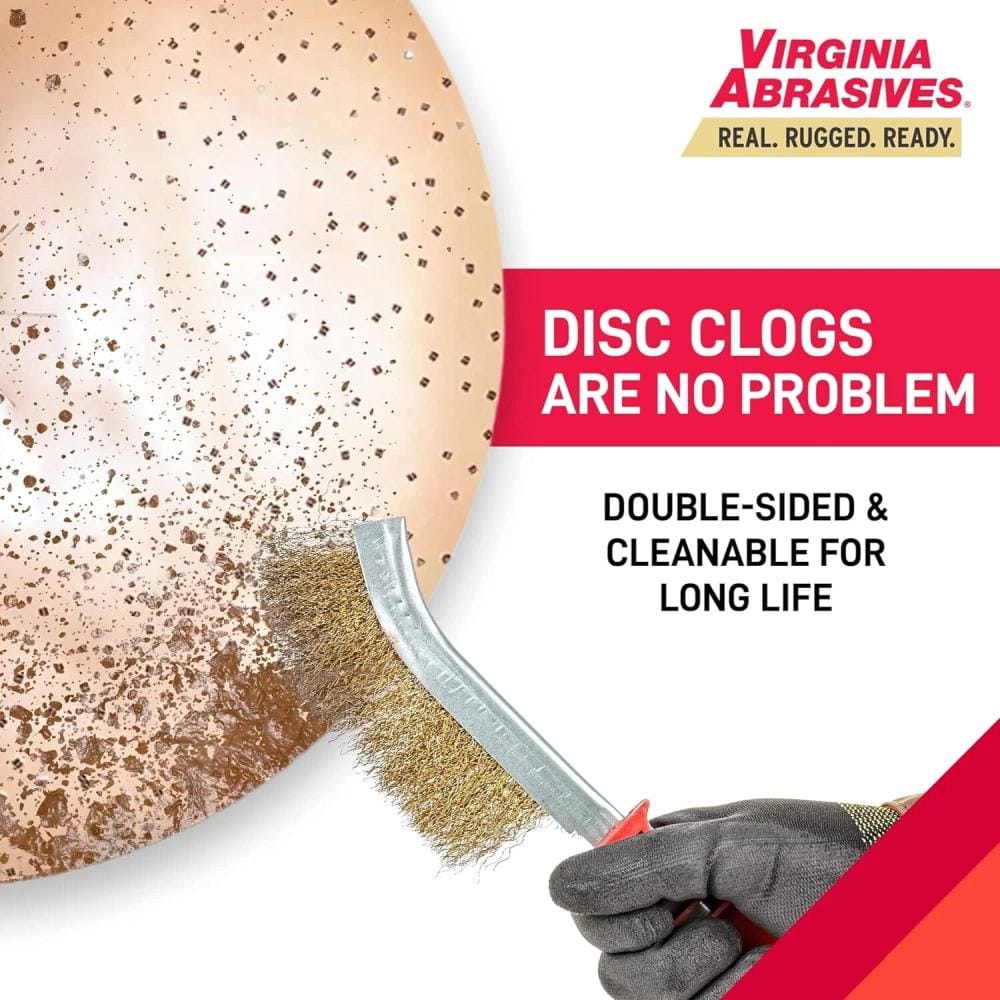 Gloved hand using a double-sided wire brush to clean debris from a clogged abrasive disc. Virginia Abrasives branding and product benefits shown