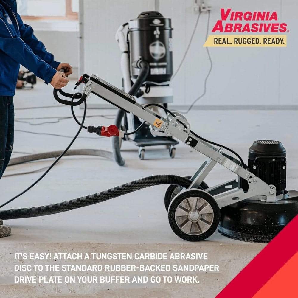 Person operating a floor buffer connected to a vacuum system in a clean indoor space. Virginia Abrasives branding and usage instructions visible.