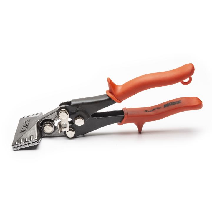 This is a picture of a hand-operated tool used for bending and flattening sheet metal. It has a black body with silver jaws that have teeth, and two orange handles with a unique curved design. The brand name "Wiss" is raised on the handle.