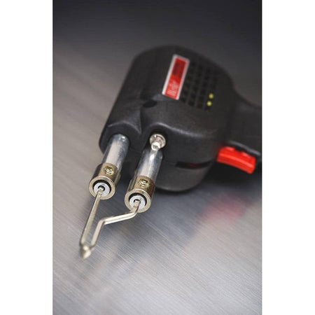 A close-up view of the Weller dual-heat soldering gun's tip assembly, highlighting the secure mounting hardware and the strategic placement of the twin LED lights for shadow-free soldering.
