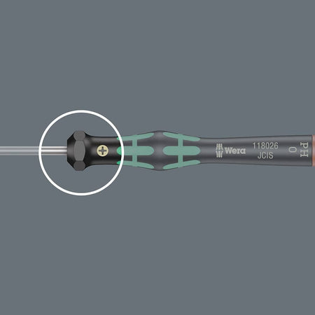 Wera screwdriver with hexagonal bolster and Phillips head; circular highlight emphasizes torque-enhancing design and branding.