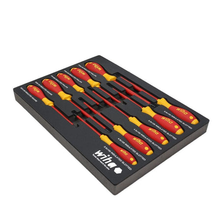 An elevated three-quarter angled product studio shot of the Wiha 10-piece insulated safety screwdriver set organized by size inside its custom-fit black foam drawer storage tray, emphasizing the streamlined handle count and professional tool chest layout.