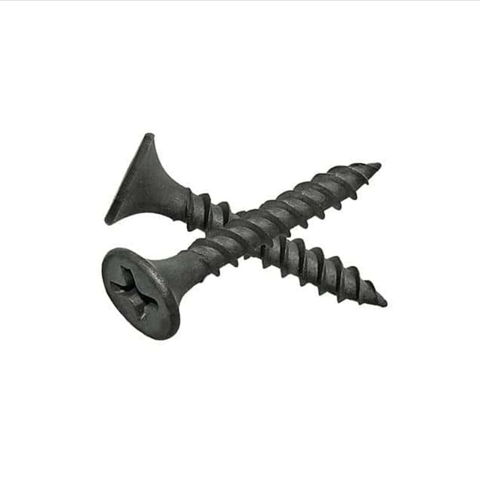 Two Kratos #6 x 1-inch fine thread drywall screws crossed to show the sharp piercing point, black phosphate finish, and reduced Phillips bugle head for light-gauge metal studs.