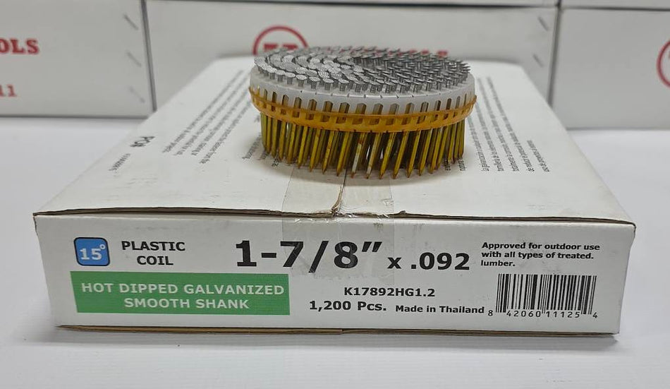 A packaged hot-dipped galvanized plastic coil filter, shown with its white cardboard box in the foreground and two matching boxes in the background. The box is labeled '1-7/8" x .