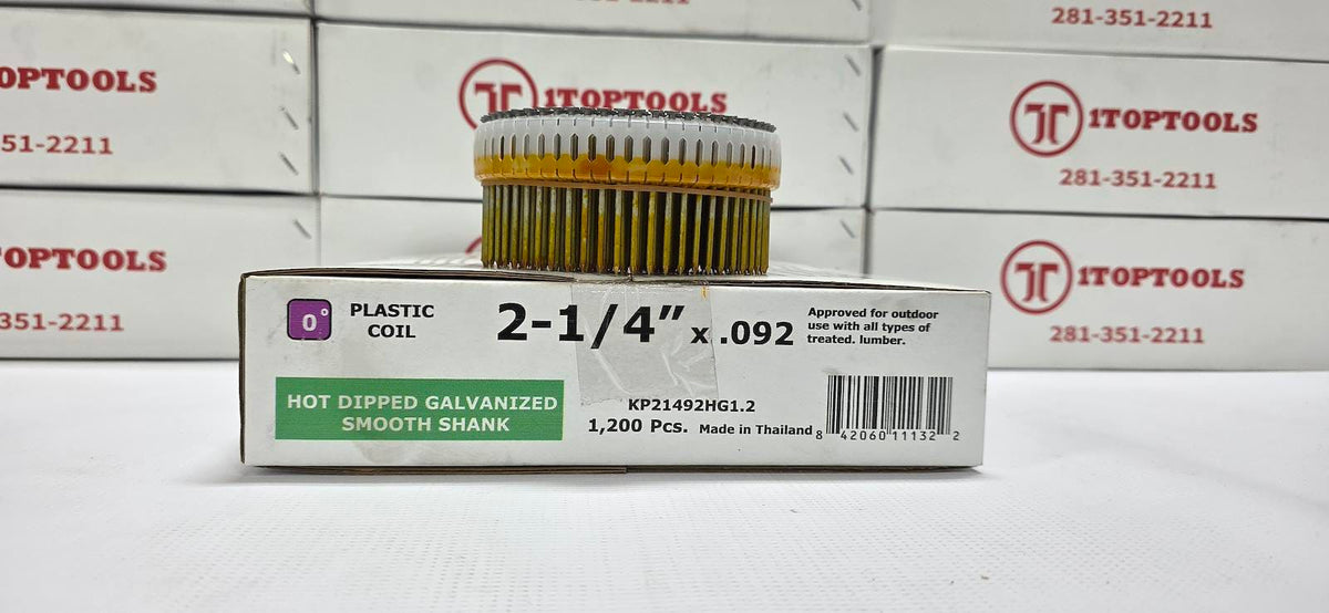 A 2-1/4 inch oil filter with a gold and black pleated body and clear plastic end caps, shown with its white and green retail packaging box in front of a background of branded Toptools boxes.