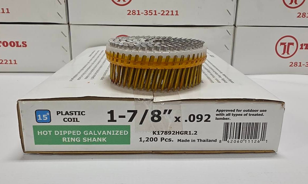 A 1-7/8" x .092 inch plastic oil filter with a gold-colored ring shank, displayed on top of its white packaging box.