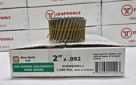 A box of KCGD92GHRL2 hot dipped galvanized ring shank wire weld coil nails, with a spool of the nails displayed on top of the box, set against a background of stacked Top Tools boxes.
