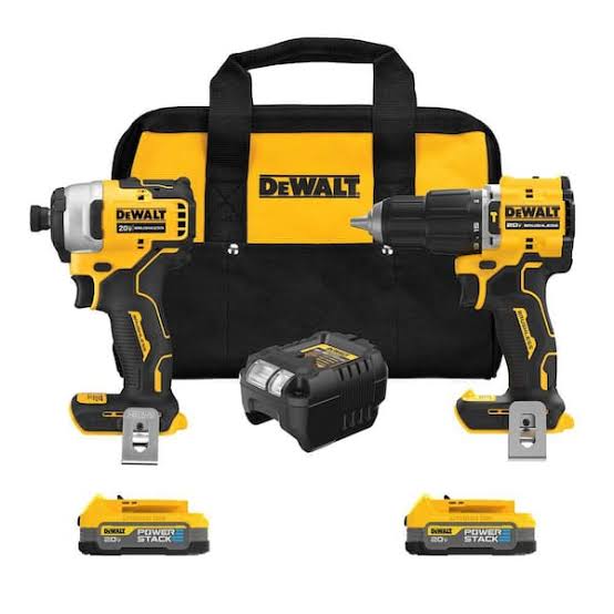 DeWalt cordless drill and impact driver kit with a black and yellow carrying bag, two batteries, and a charger on a white background.