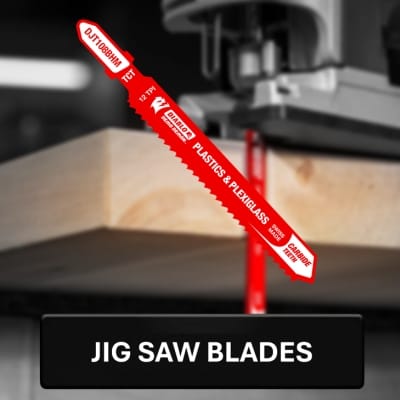 Red jig saw blade with text on a blurred workshop background