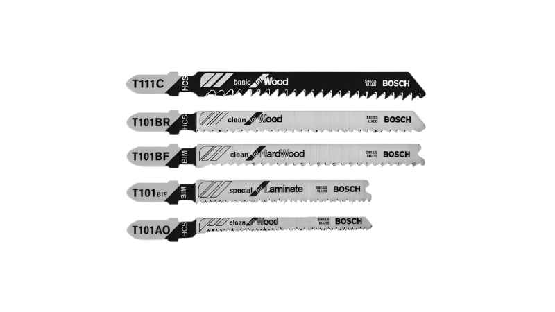 Bosch 5 Pc. T-Shank Jig Saw Blade Set for Pro-Wood. The image displays a set of five Bosch T-Shank jigsaw blades, laid out horizontally. Each blade is elongated with teeth along one edge and features branding that includes "BOSCH" and descriptions like "basic Wood," "clean Wood," "clean HardWood," "special Laminate," and "clean Wood."