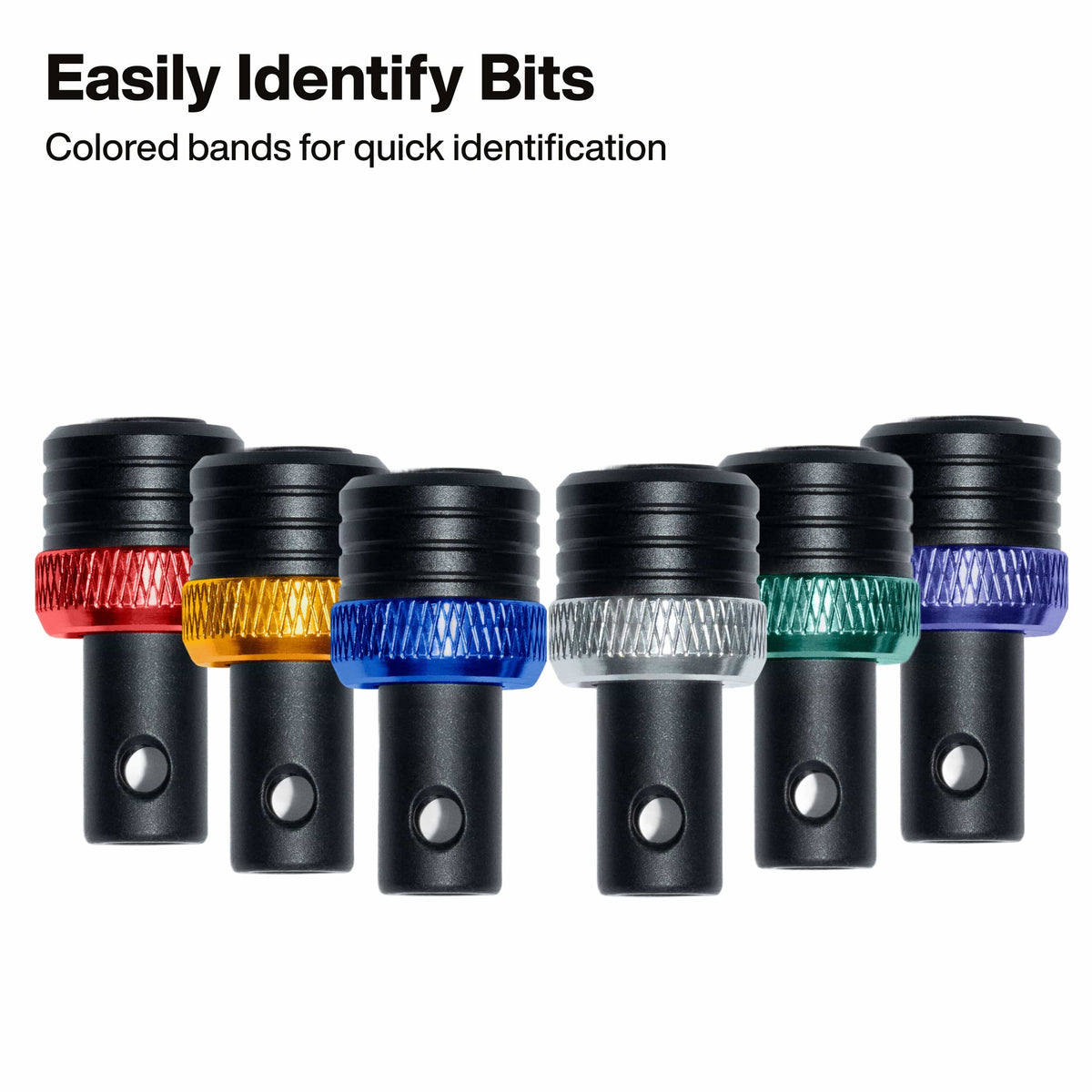 Six black cylindrical hardware pieces arranged in a row on a white background, each with a different colored band around the middle: red, gold, blue, clear, green, and purple. Text at the top reads 'Easily Identify Bits' and 'Colored bands for quick identification.