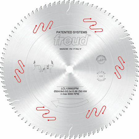 This is a circular, silver-colored saw blade with a large number of sharp teeth along its entire perimeter. The center of the blade is marked with the "freud" logo and includes technical specifications and diagrams in black text, along with several red, squiggly lines that highlight different parts of the blade.