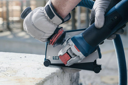 BOSCH DBX641S 6 In. X-LOCK diamond blade cutting pavers and soft brick with 7/8 In. arbor on angle grinder.