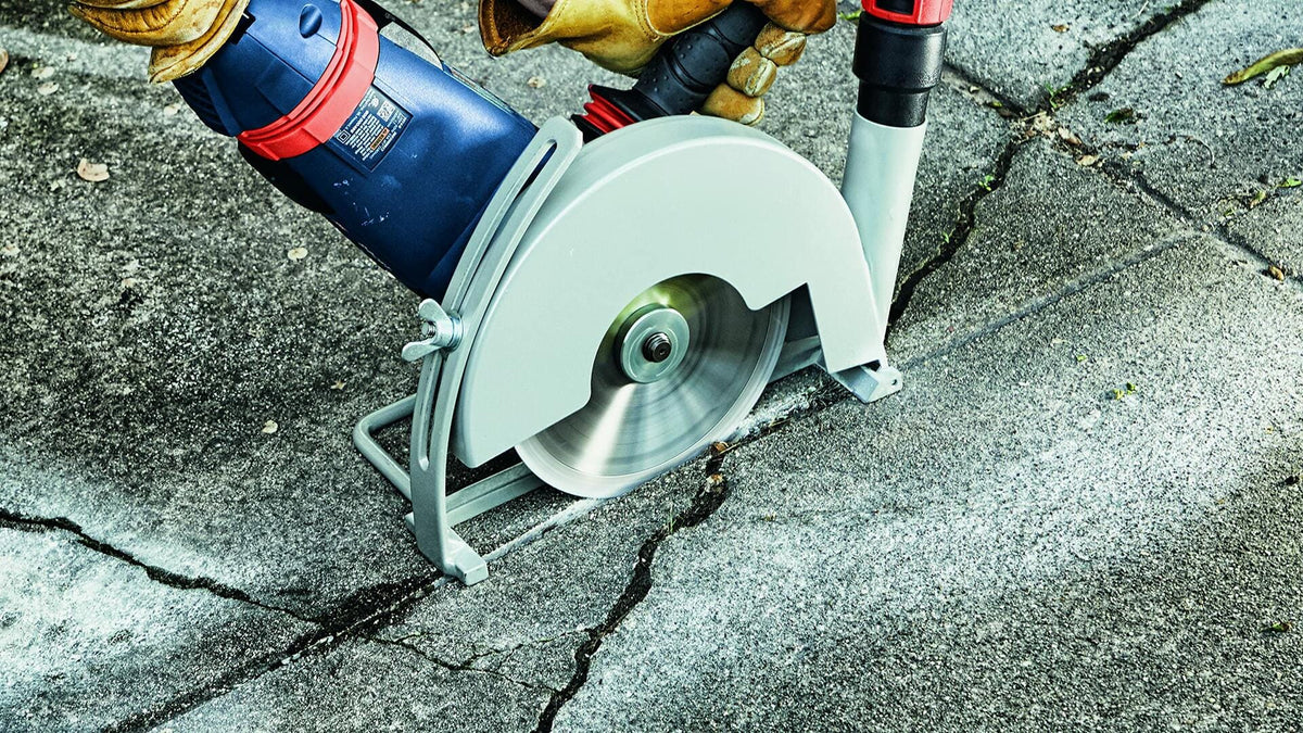 BOSCH DB741SD 7 in. Standard Segmented Rim Diamond Blade cutting concrete with 7/8 in. diamond arbor knockout for wet/dry use.
