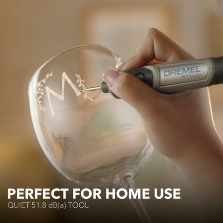 Dremel 2050-15 Stylo+ rotary tool engraving glass with precision for home crafting projects and detailed artwork