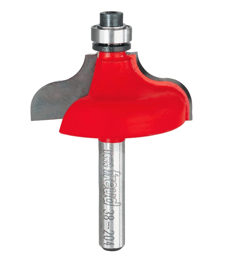 Studio shot of the Freud 38-204 Ogee and Fillet router bit featuring a red Perma-SHIELD body, two carbide cutters, 1/4 inch silver shank, and top ball bearing guide.