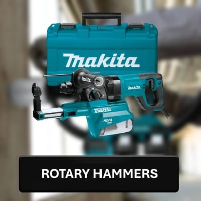 Makita rotary hammer with carrying case on a blurred background