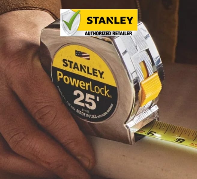 Stanley PowerLock tape measure being held by a person, with a visible 'Authorized Retailer' badge.