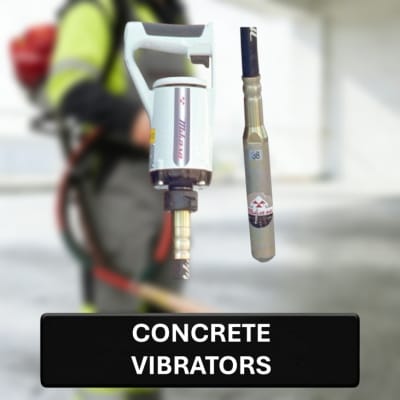 Concrete vibrator with a blurred background of a construction site.