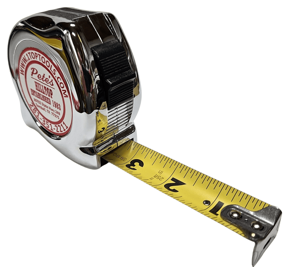 Angled view of the chrome tape measure with the 1 inch wide yellow blade partially extended, showing high visibility SAE scale markings and the thumb lock mechanism.