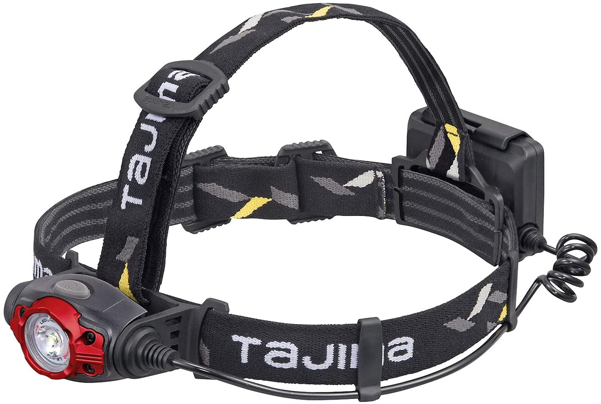 This one looks like a Tajima brand, as the name is visible on the straps. It appears to have an adjustable elastic headband and a light unit with a red accent around the lens.