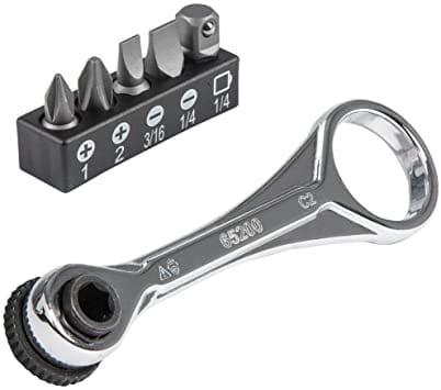 Image of Klein Slim-Profile Mini Ratchet Set, 5-Piece 65200
The image shows a set of tools on a white background. A silver ratchet with a black rotating base is in the foreground. Behind it is a black holder containing several small, silver screwdriver bits. The bits vary in size and shape, including flat-head and Phillips head. The tools appear to be for precision work.