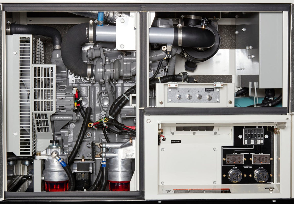  Open interior of the generator, you can feel a complex arrangement of machinery. There are thick, flexible hoses and numerous wires bundled together. You encounter a solid, textured block that is likely the engine, with various smaller components attached to it. You might also feel a large, finned panel, probably a radiator for cooling. On a nearby panel, there are several smooth, round knobs and some rectangular switches. The overall impression is of a tightly packed and powerful piece of equipment.