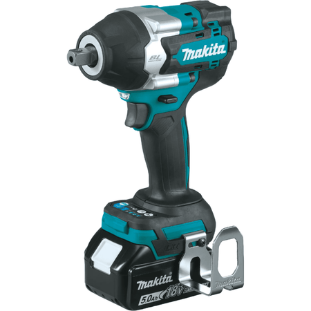 Makita 18V LXT® Brushless Cordless 4‑Speed Mid‑Torque 1/2" Sq. Drive Impact Wrench Kit w/ Detent Anvil (5.0Ah) side view. The image shows a teal, black, and silver Makita cordless impact wrench standing upright against a white background. The power tool has a square drive socket on the front, a comfortable black grip, and is attached to a black and teal battery pack at its base.